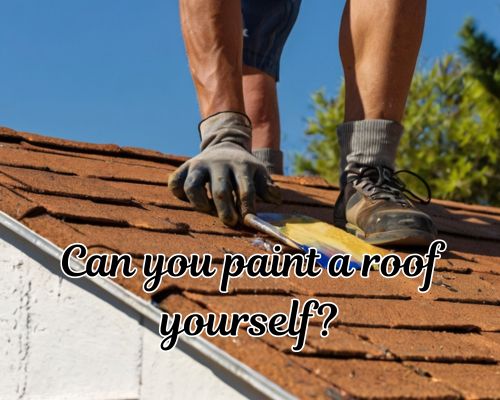Painted sections on roof as roofer works.