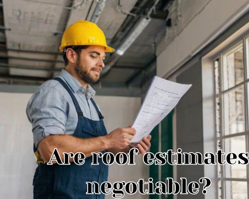 Roofer examines plans for estimation.